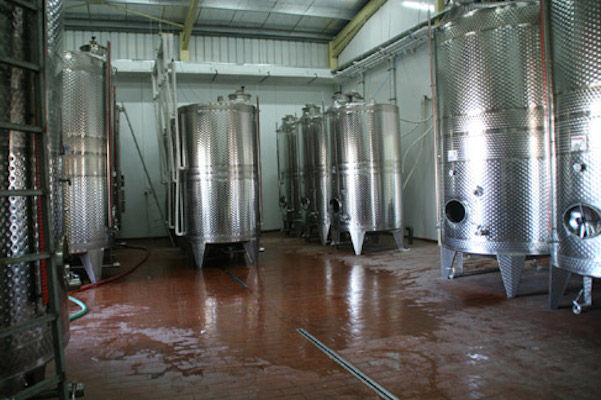 aluminum wine fermentation tanks at 'Theodorakakos Estate winery' facilities